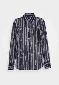Camicia azzurra con bottoni in materiale trasparente, caratterizzata da un motivo a corda bianca con linee verticali e polsini a righe in contrasto. Design a taglio regular.
