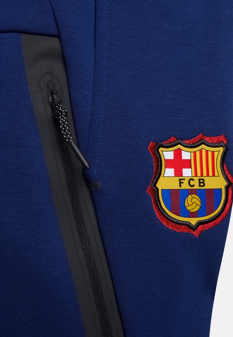 Kinder Sportbekleidung | Nike Performance FC BARCELONA TECH FLEECE PANT Jogginghose blue void/game royal/black/blau - KF71917 Kinder Sportbekleidung | Nike Performance FC BARCELONA TECH FLEECE PANT Jogginghose blue void/game royal/black/blau - KF71917