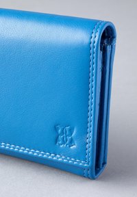 Blue leather wallet with embossed detailing, neat stitching, and a folding design. Smooth texture and clean lines are prominent features.