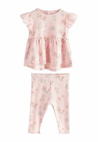 Lys pink to-delt outfit med en blomstret top med broderede ærmer og matchende leggings med en flæsekant.