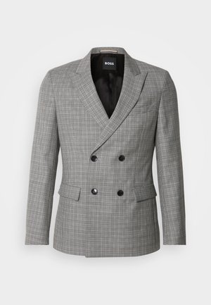 Blazer cinza xadrez de dupla abotoadura com botões pretos, lapelas pontudas e bolsos frontais. Tecido suave com um ajuste sob medida. Interior forrado.