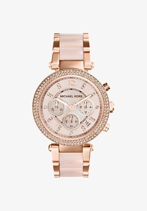 Hodinky na zápästie Michael Kors z ružového zlata s číselníkom zdobeným kryštálmi, tromi podčíselníkmi, ukazovateľom dátumu a kovovým remienkom.