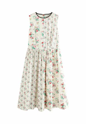 Blumenkleid in hellem Creme mit ärmellosem Design, ausgestattet mit einem schwarzen Ausschnitt und einem gerafften, voluminösen Rock mit mehrfarbigen Blumenmustern.