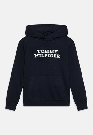 Sweat à capuche bleu marine avec poche avant et texte blanc "TOMMY HILFIGER" sur la poitrine, présenté sur un fond blanc.