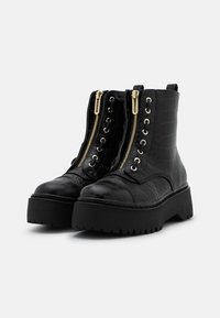 Call it Spring Stivaletti con plateau - black