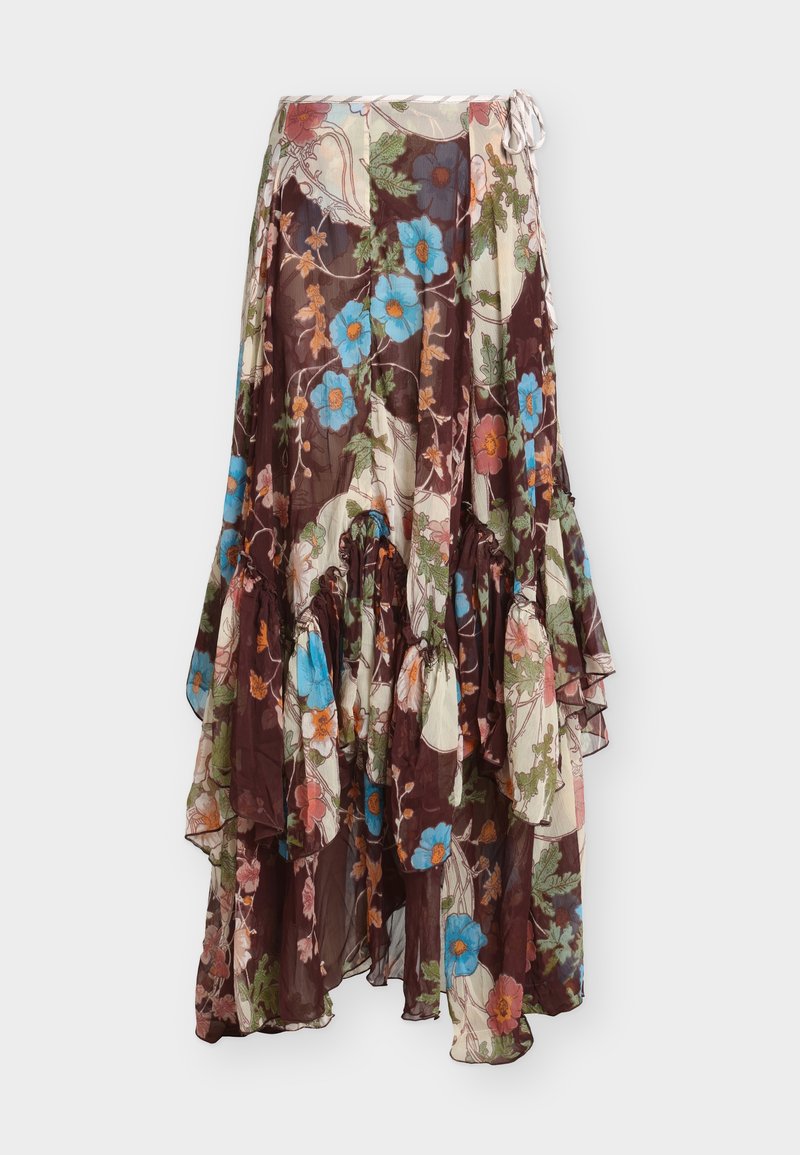 Jupe longue fleurie en tissu semi-transparent. Elle présente des volants sur l'ourlet, des motifs floraux multicolores sur un fond marron foncé et un cordon de serrage.