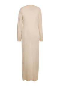 Rochie maxi bej, cu mâneci lungi și textură canelată. Prezintă o croială dreaptă și un decolteu rotund, fiind confecționată dintr-un material tricotat ușor.