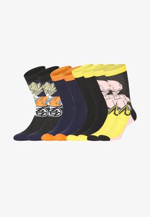 Sept paires de chaussettes de sport en noir, marine et jaune avec des motifs de personnages d'anime et des orteils et poignets de couleur contrastée.