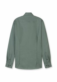Grünes Langarmhemd mit spitzem Kragen, strukturierter Stoff, Manschetten mit zwei Knöpfen und Mittelrückenpasse. Klassischer Schnitt.