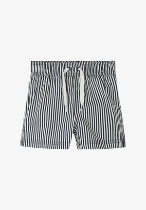 Pasiaste kąpielówki w granatowo-białe paski, z elastycznym pasem ze sznurkiem, wykonane z lekkiego materiału i w luźnym kroju.