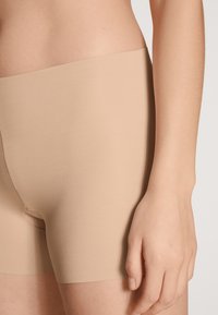 Calida NATURAL SKIN PANTY SEAMLESS - Nadrág - rose teint