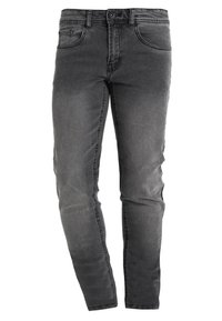 Jeans de mezclilla gris con un ajuste slim, diseño de cinco bolsillos y un sutil efecto desgastado. Presenta costuras visibles y una tapeta de botones.