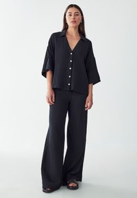 ST MRLO LETTY RELAXED  - Pantaloni - black