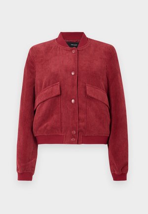 Rode corduroy bomberjack met voorste drukknoopsluiting, twee schuine klepzakken, ribgebreide kraag, manchetten en zoom.