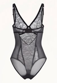 Svart bodysuit i spets och genomskinligt material, med en djup V-ringning, justerbara remmar och ett utskuret hjärtformat mönster i mitten.