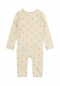 Långärmad bodysuit i ljusbeige bomull, med spridda små gyllene hjärtmönster och en delikat kant runt halsringningen.