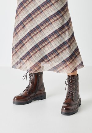 Tamaris Bottines à plateau - brown