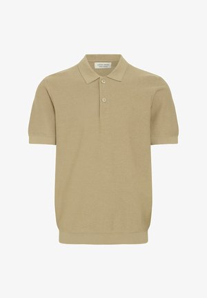 Bež lühikeste varrukatega polo särk, mis on valmistatud tekstuuriga kangast ja millel on klassikaline krae ning kolme nupuga nööpide rida. Lihtne disain, ilma kaunistusteta.