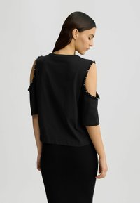 LIU JO WITH BEADS AND RHINESTONES - Triko s potiskem - black