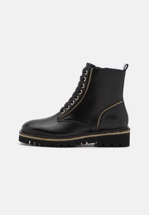 Schnürstiefelette - black