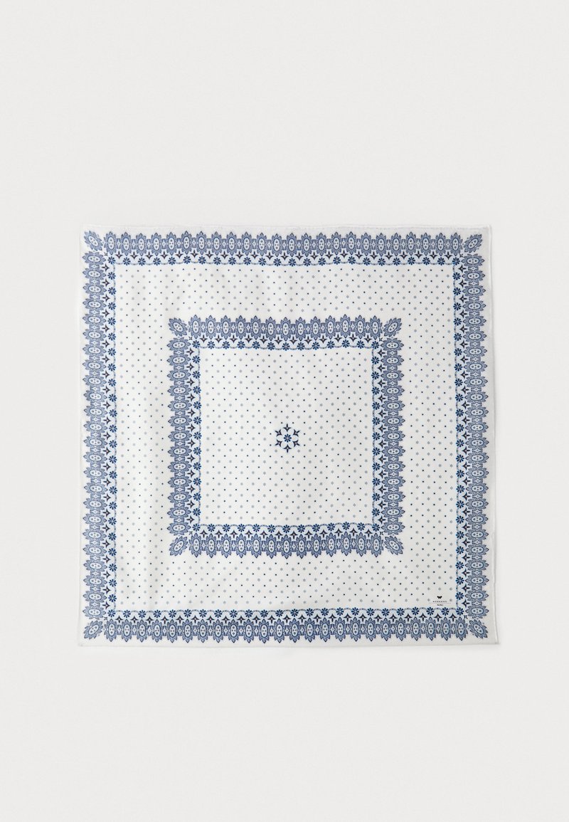 White scarf with blue patterned borders. Features a central polka dot design, surrounded by intricate floral accents and geometric shapes.