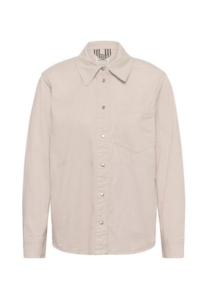 Light beige long-sleeve shirt with pointed collar, front snap buttons, and a single chest pocket on a white background.