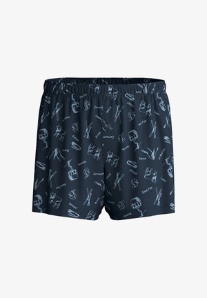Marineblaue Schwimmshorts mit elastischem Bund, die mit einem wiederholten Muster von ski-bezogenen Grafiken und den Namen Schweizer Ferienorte in hellen Farben versehen sind.