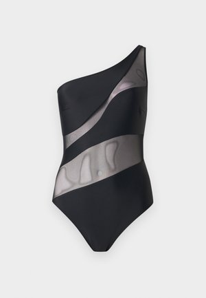 Čierne jednodielne plavky s jedným ramienkom a diagonálnymi priesvitnými sieťkovanými panelmi cez trup a pás na jednoduchom svetlom pozadí.