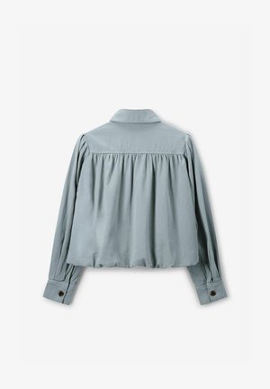 Light blue, collared cropped shirt with long sleeves, gathered back, and buttoned cuffs. Made of smooth, lightweight fabric.