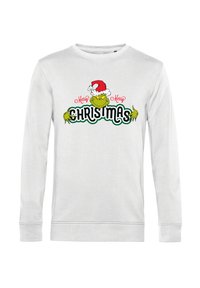 Pullover bianco a maniche lunghe con un personaggio verde che indossa un cappello di Babbo Natale e la scritta "Buon Natale" in rosso e nero. Materiale morbido, collo a giro.
