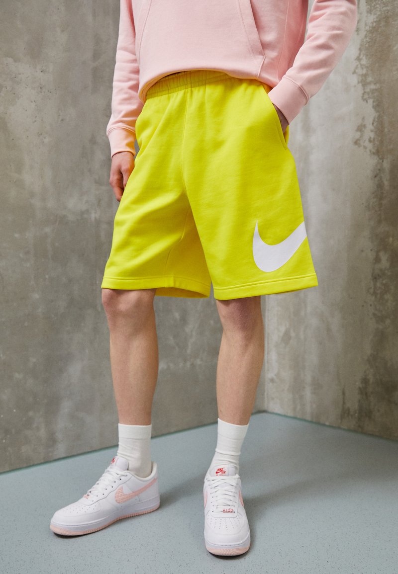 Nike Sportswear CLUB Tracksuit bottoms opti yellow/white/yellow Zalando.co.uk