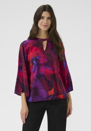 Camicetta - blurred red print