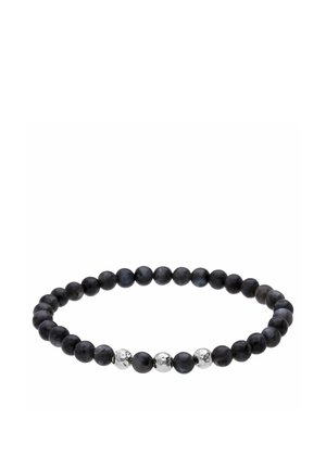 Bracelet en perles noires avec quatre perles argentées regroupées, disposées en cercle sur fond blanc.