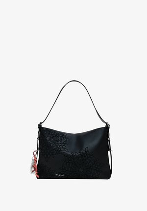Black leather handbag with floral embossing, curved shape, adjustable strap, and decorative charms attached to the zipper.