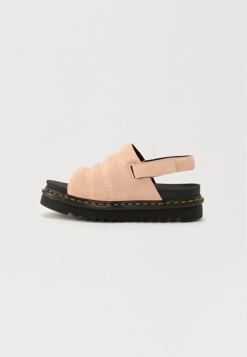 Pink suede sandal with a black platform sole, featuring three horizontal stripes and a back strap for support. Yellow stitching accents.