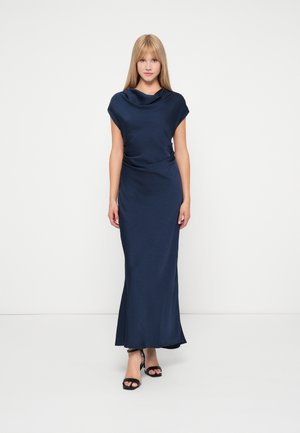 Middellange navyblauwe jurk met een gedrapeerde halslijn en korte kapmouwen. Glad, textuurstof, aansluitend bovenlijf dat overgaat in een vollere rok.