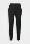 STRIDE WORKOUT PANTS - Tréningruha alsók - black
