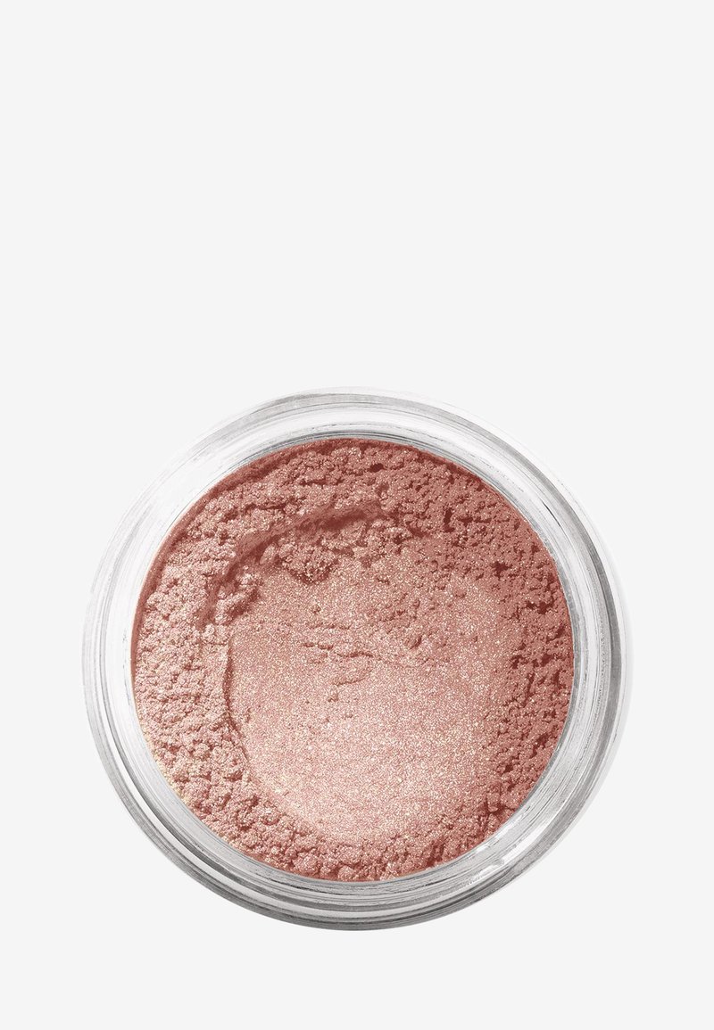 Losse poederblush in een doorzichtige container; zachte roze tint met een glanzende afwerking; fijne textuur die soepel en licht aanvoelt.