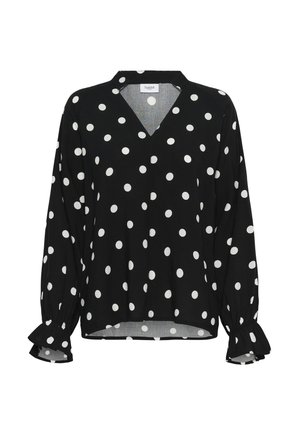 Musta pitkähihainen pusero, jossa valkoisia pilkkuja, V-aukko ja röyhelöidyt hihansuut.