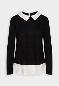 Svart långärmad topp med vit krage. Designen har ett lagerutseende, med en slät textur och en dragkedja på baksidan av halslinningen.