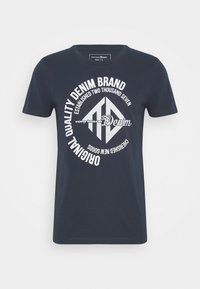 Navy blue cotton t-shirt featuring a round neck and short sleeves. Front graphic in white text and geometric design. Standard fit.