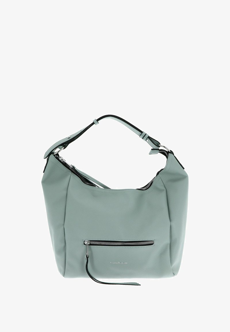 Sac à main en cuir vert clair avec une texture douce, une forme courbée, une bandoulière noire et une poche zippée à l'avant. Détails en métal argenté visibles.