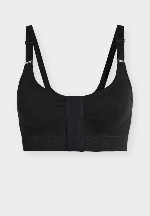 Soutien-gorge sans fil noir avec bretelles réglables et large bande de fermeture frontale, bonnets sans coutures et texture de tissu lisse.
