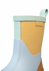 Colorful rubber boot featuring a light blue bottom, yellow upper, and light green accent at the top, with textured grip and a pull tab.