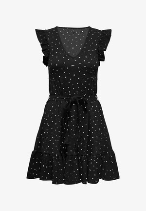 Zwarte mouwloze jurk met witte polkadots, V-hals, gerimpelde schouders en zoom, en een strakke ceintuur in de taille.