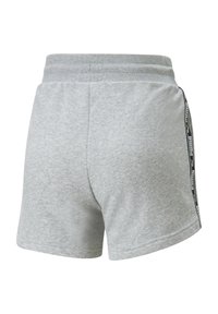 Pantaloni corti in cotone grigio con elastico in vita e dettagli laterali con brand nero. Texture morbida e design casual adatto per l'abbigliamento sportivo.