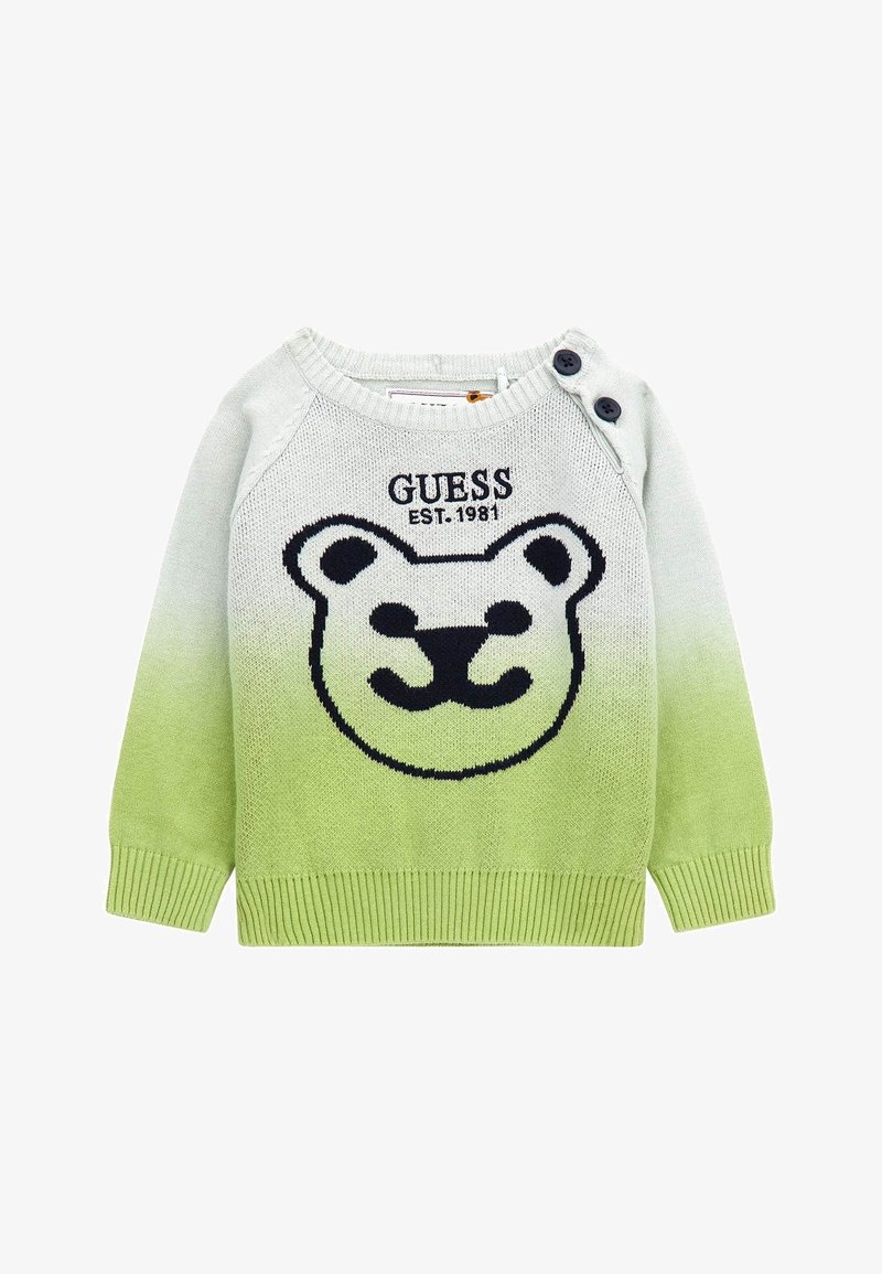 Dětský svetr s přechodem ze zelené do bílé, s černým obrázkem medvědí tváře, nápisem "GUESS EST. 1981" a dvěma černými knoflíky na jednom rameni.