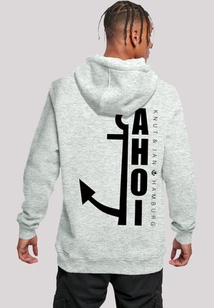 Gray hoodie with a spacious hood, featuring a large black graphic print with an arrow and text on the back, made from soft fabric.