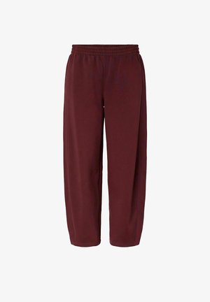 Pantalon de survêtement bordeaux en tissu doux, doté d'une ceinture élastique et d'une coupe décontractée pour le confort et la liberté de mouvement.