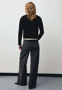 Mango Jopica - black